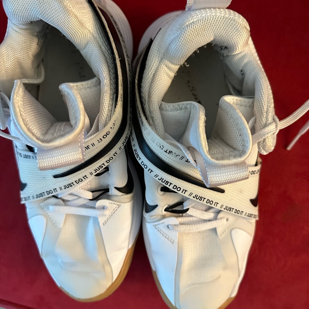 White and black Nike basketball/volleyball shoes- GUC